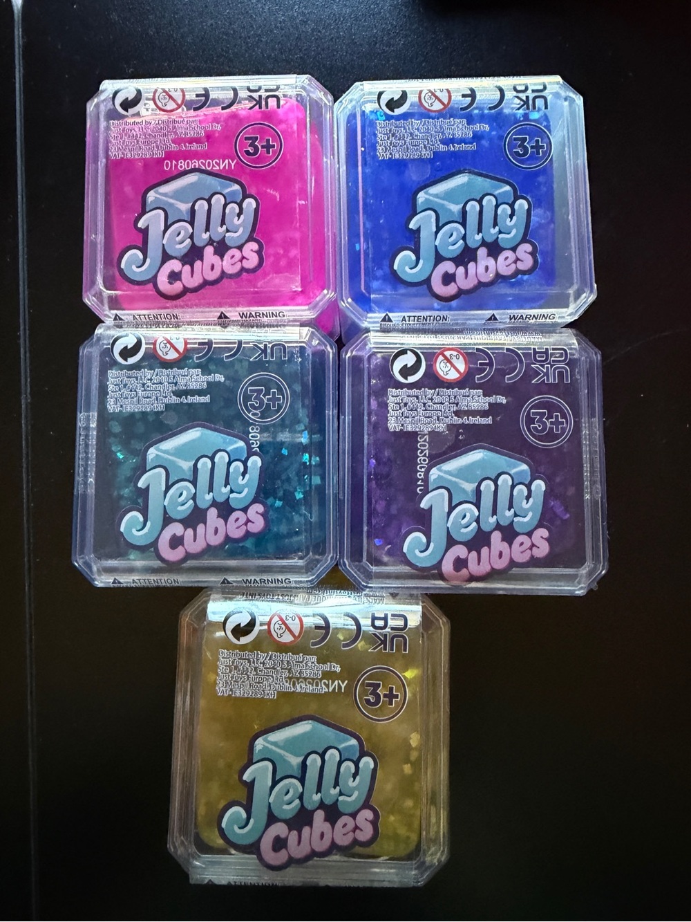 New 5 Just Toys Jelly Cubes 2.5" Squishy Squeeze Glitter Pink Blue Purple Yellow
